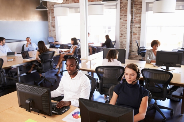 office space with employees using computers