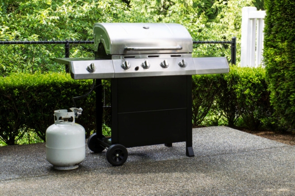 old grill with tank to be recycled
