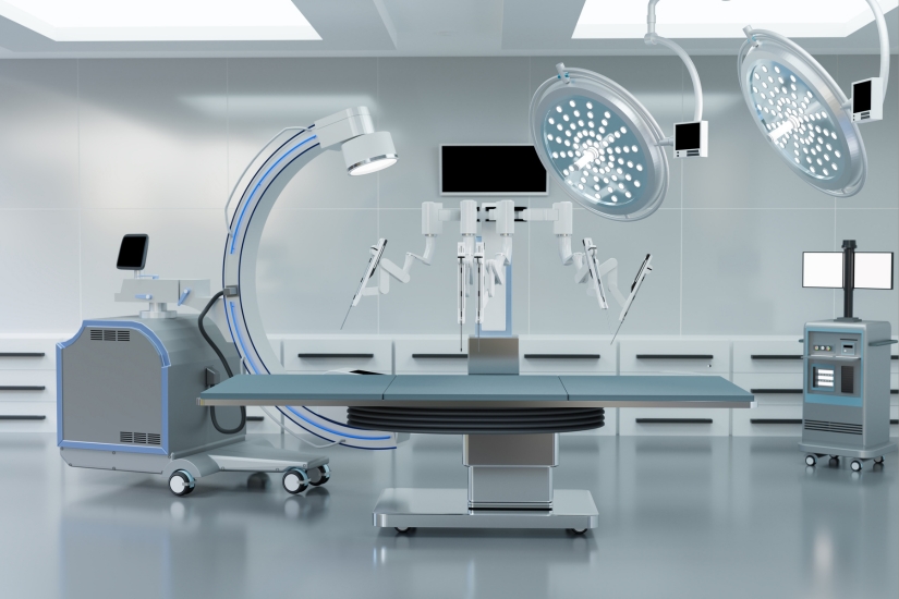 Robotic surgical table with C-arm and overhead lights