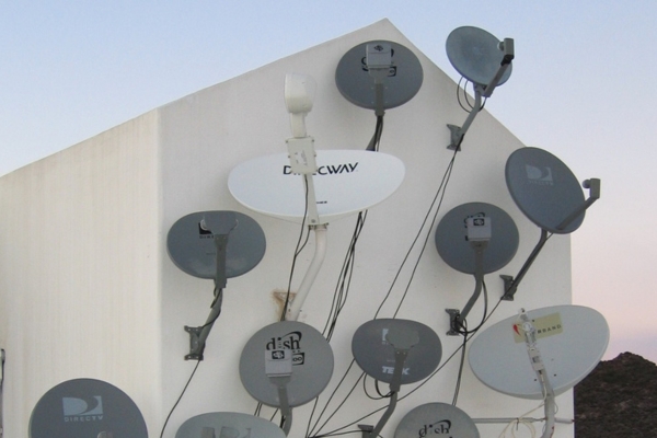 cluster of old satellite dishes to be recycled