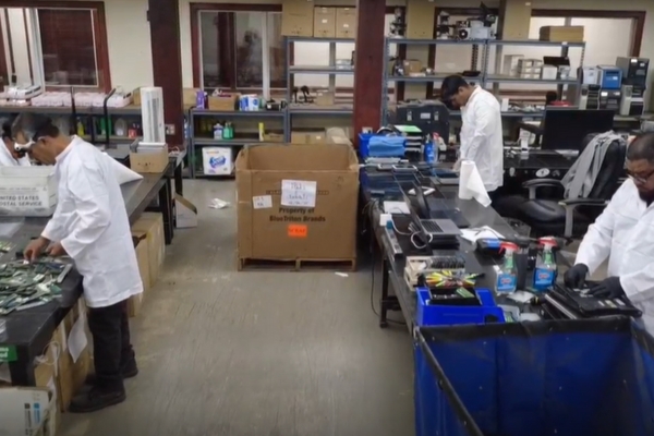 EACR Inc workers sorting hard drives