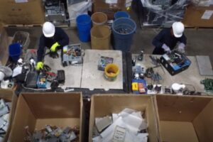 EACR Inc. employees sorting e-waste