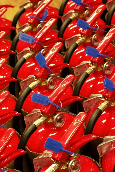 a bunch of fire extinguishers