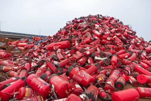 huge pile of fire extinguishers
